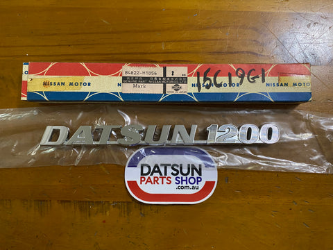 Datsun 1200 Coupe Boot Badge Nos KB110