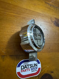 Datsun 1200 Grill Badge Used