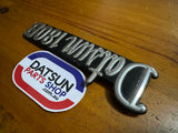 Datsun 180B 1/4 Panel Badge Used 610 (missing pin)