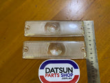 Datsun 1000 B10 Early Front Light Lens Pair NOS