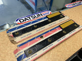 Datsun 1600 Guard Badge Pair to Suit Datsun 720 Genuine New Old Stock